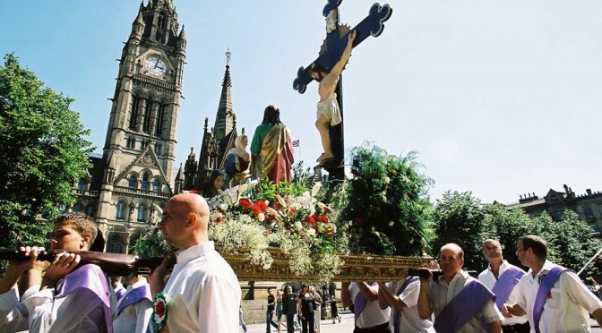 Carrying the emblems at the Madonna del Rosario Procession, Manchester