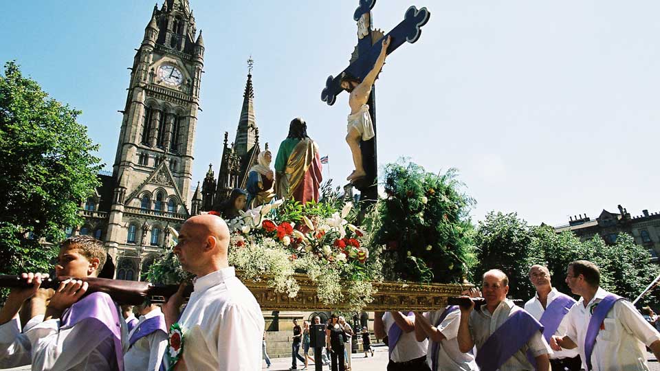 Carrying the emblems at the Madonna del Rosario Procession, Manchester